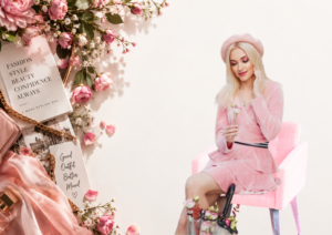 “Elegant pink fashion and beauty aesthetic with floral decor and stylish woman in pink outfit”
