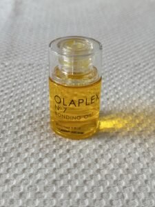 Olaplex No 7 Bonding Oil bottle for hair repair and shine on Aymax Blush