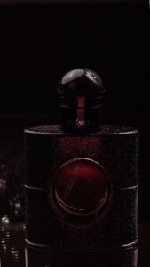 YSL Y Eau de Parfum luxury black perfume bottle on dark background | Aymaxblush