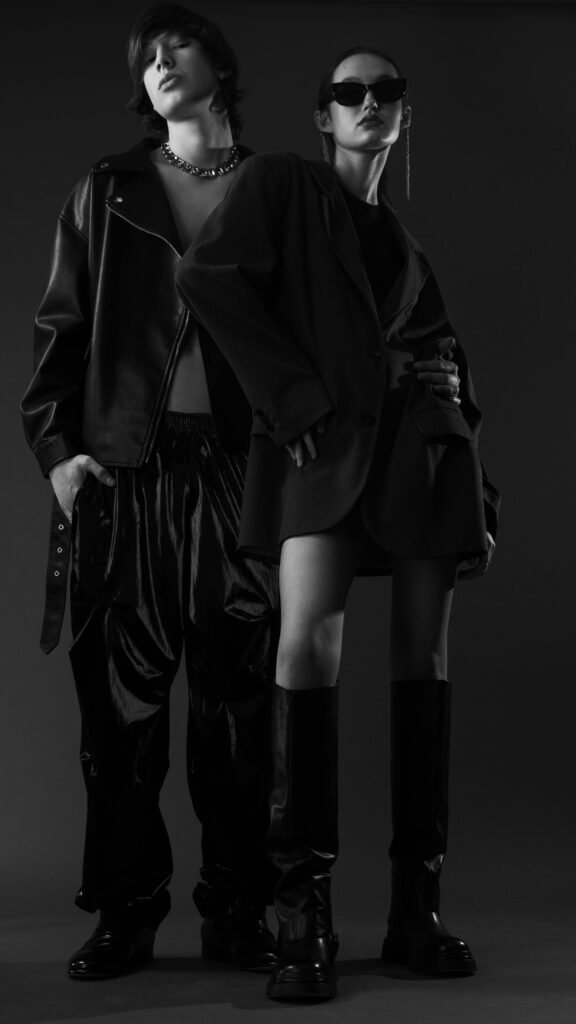 fashion in 2026 trendy black outfits with oversized blazer, leather jacket, and knee-high boots | AymaxBlush