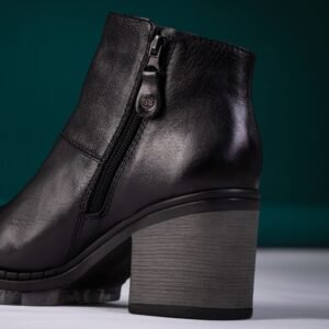 Black leather ankle boots with a chunky block heel and side zipper