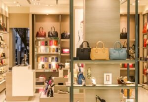 Luxury designer handbags displayed in a high-end fashion boutique