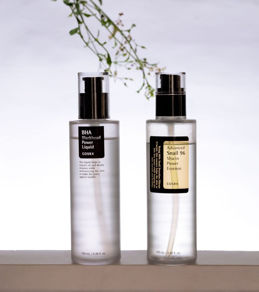 Korean skincare products featuring COSRX BHA Blackhead Power Liquid and Advanced Snail 96 Mucin Power Essence